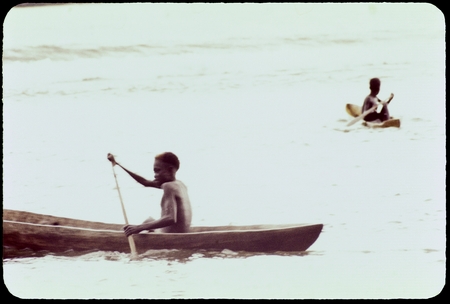 Boys in canoes