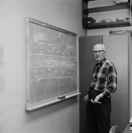 Martin W. Johnson at blackboard, Scripps Institution of Oceanography