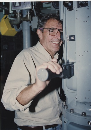 J. Robert Beyster with submarine periscope