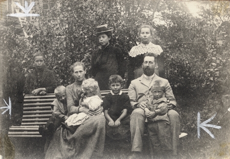 Sverdrup Family: Harald Ulrik Sverdrup, upper left, father Edward Sverdrup and mother Agnes Sverdrup seated on bench