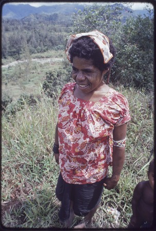 Western Highlands: smiling woman with tattooed face