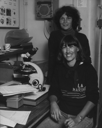 Geologists Anne-Marie Karpoff (sitting) and Judy McKenzie (standing) during Leg 73, of the Deep Sea Drilling Project. 1980.