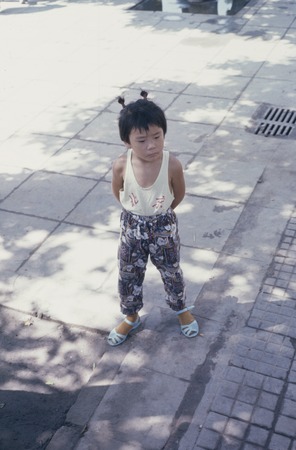 Child in tank top