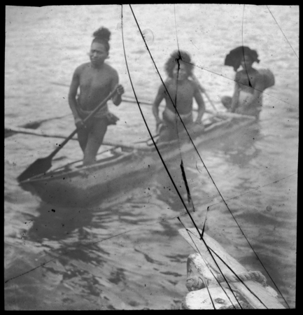 Three men in a canoe