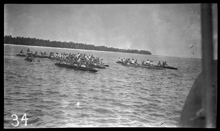 Men in canoes