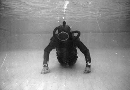 SIO student diver trainee in 1952 in La Jolla Beach and Tennis Club Pool. SIO diver training was early non-military diver ...