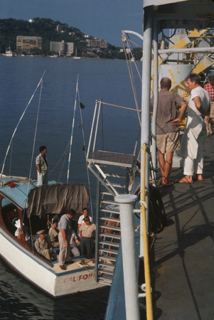 During the Swan Song Expedition (1961) a member of the crew took this photo of the ferryboat &quot;California&quot; taking members t...