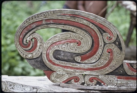 Canoes: carved and painted branch-end style prowboard on a kula canoe
