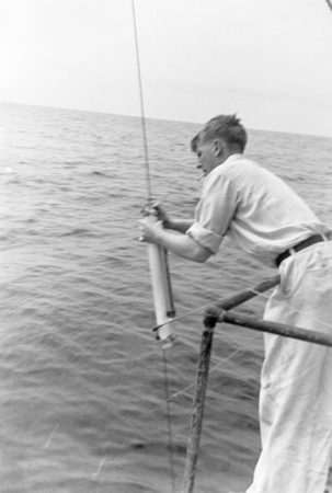 Richard Howell Fleming with a Nansen bottle on board the Scripps research vessel R/V Scripps