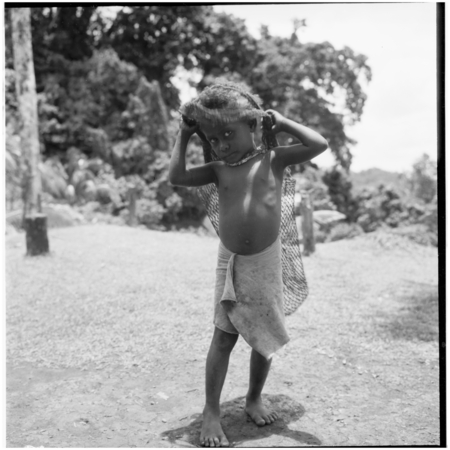 Child with string bag