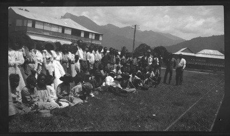 Group on lawn outside a building