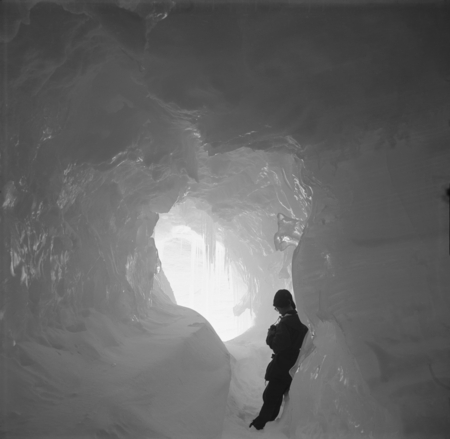 Scientist Eugene N. Gruzov in an iceberg cave