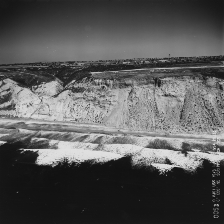 Aerial view of the cliffs and the canyon just north of Scripps Institution of Oceanography. September 1954.