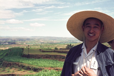 Local Guide Standing by Terraced Fields