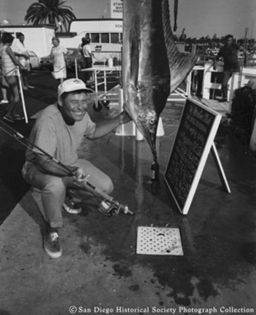 Bob Newton posing with marlin catch at San Diego&#39;s Marlin Club