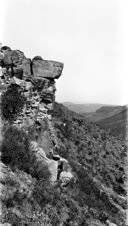 Outer edge of basalt rim at south end of Tigre Flat, facing east