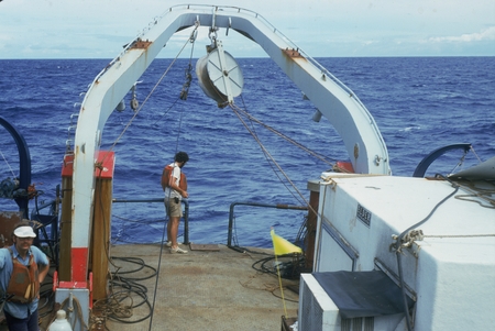 Randall Scott Jacobson putting out long seismic array. Onboard R/V Thomas Washington, Indopac Expedition. July 21, 1976