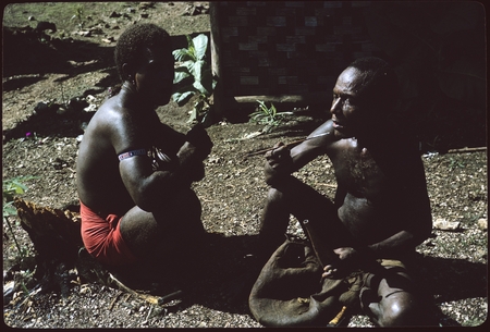 Two men talking at Ngarinaasuru.