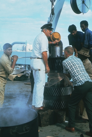 Seychelles, 1971 [Men working on equipment on R/V Melville]