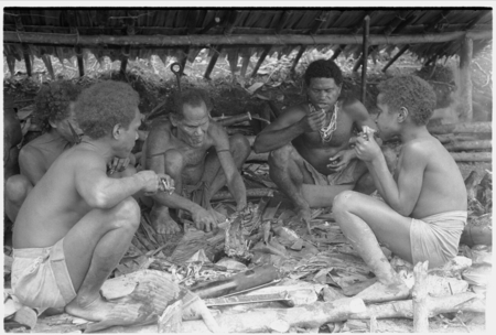 Men eating pork after a purificatory sacrifice.