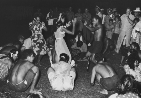 Marquesans at the village of Taiohae perform &quot;Nuku Hiva&quot; dance, with scientific crew from the Capricorn Expedition as audi...