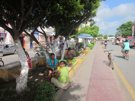 Tixkokob Women selling fruit along street