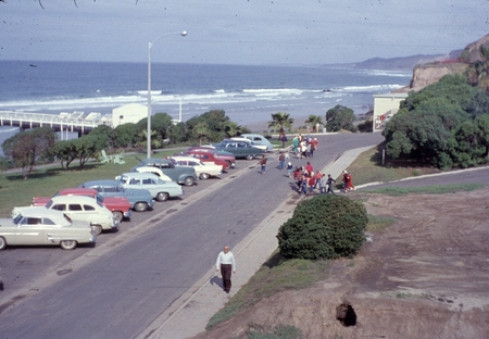 Visiting school children walking along the campus of Scripps Institution of Oceanography. March 1958.