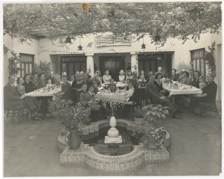 Family banquet in interior courtyard of Fletcher home at 4th and Walnut Avenue, San Diego