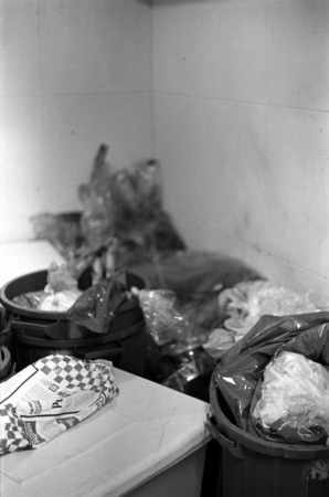 Body Bags: remains of destroyed sculpture in the trash