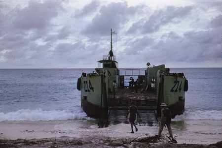 Landing craft on the beach on Bikini Island, this photo was taken by a member of the Capricorn Expedition (1952-1953). Ope...