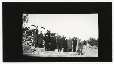 Group portrait of men standing near Mount Helix cross