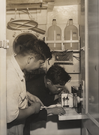 Richard Morita of Scripps Institution of Oceanography and Claude ZoBell&#39;s student, and Noriyuki Nasu, doing bacteriologica...