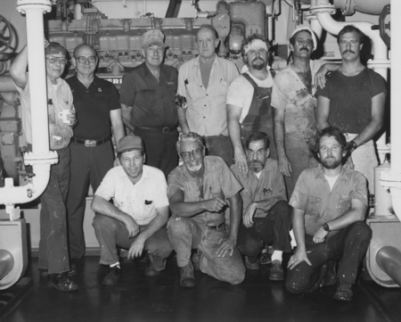 Engine room crew for the research vessel D/V Glomar Challenger (ship) during Leg 96 of the Deep Sea Drilling Project. 1983.