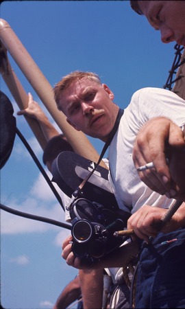 Cameraman aboard the USC&amp;GS Pioneer during the International Indian Ocean Expedition. 1964