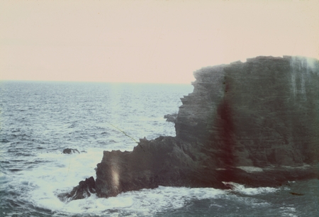 Microbiologist Richard Y. Morita who served on the MidPac Expedition (1950), took this photo of a volcanic lava outcrop du...