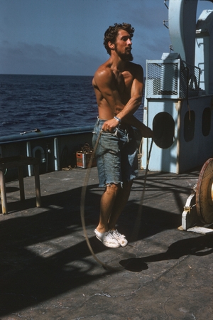 Robert S. Kiwala a member of the Swan Song Expedition (1961) is shown here exercising on board the R/V Argo during the Swa...