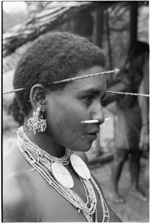 &#39;Oiru&#39;a, wearing fio nose pin, &#39;ausakwalo earsticks, girigwei&#39;a clamshell pendants, kwari&#39;ingari nut and bat-tooth ear orn...