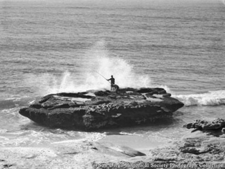 Men fishing from rock on La Jolla coast