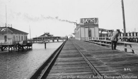 Railroad tracks and bathhouse on [Santa Fe?] wharf, San Diego waterfront