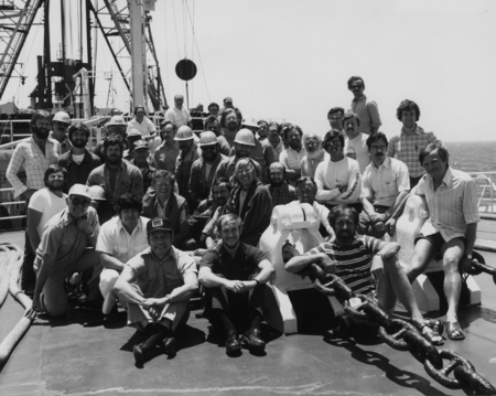 Entire crew on the foredeck of the D/V Glomar Challenger (ship) during Leg 79 of the Deep Sea Drilling Project. 1981.