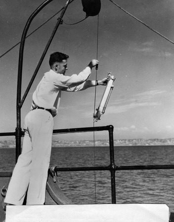 Roger Revelle with a Nansen Bottle on the Scripps Pier