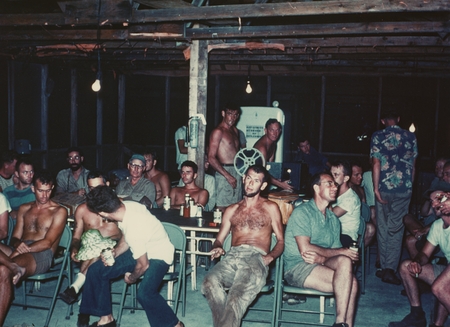 Beer and movie at the Back and Atom Club, Bikini Island, during Capricorn Expedition. November 4, 1952. Front: Willard Bas...
