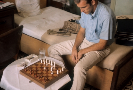 Thomas W.C. Hilde [playing chess] Majestic Hotel [Saigon]