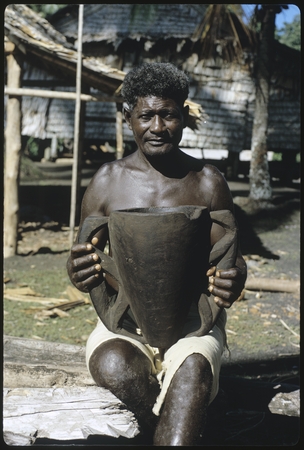 Man holding pottery