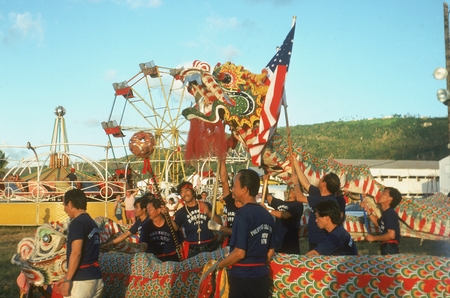 Guam, Men from Chiu Lien with dragon for Liberation Day ceremony