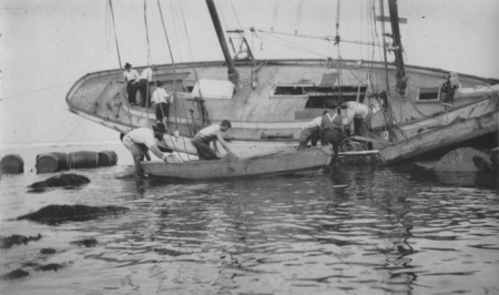 Robert H. Baker, Manuel Cabral and others working on the salvage of the wreck of the &quot;Loma&quot; given to the Marine Biological...