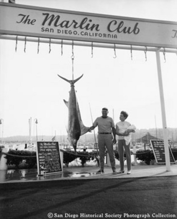 Bob Newton posing with his marlin catch at the Marlin Club