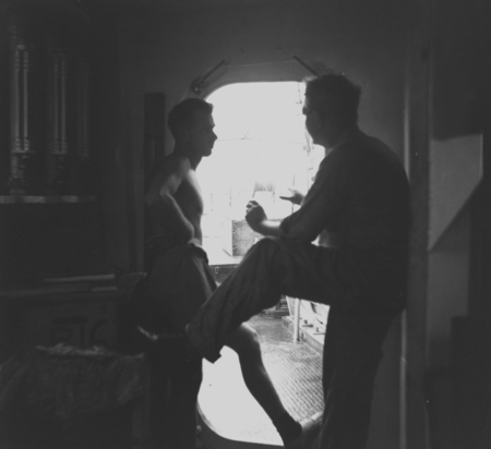 Willard Bascom and John Isaacs discuss matters onboard R/V Spencer F. Baird, Capricorn Expedition, 1952