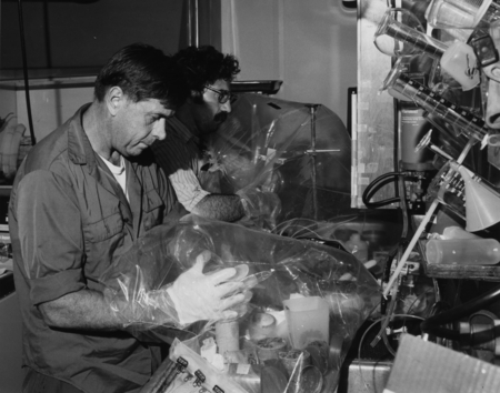 Scientist Michael Bender and technician Jim Pine (in glasses) taking samples in the chemistry laboratory aboard D/V Glomar...