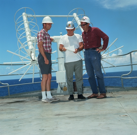 The &quot;Big Three&quot; near the weather antenna aboard the research ship D/V Glomar Challenger. (Left to right) Melvin N.A. Peter...